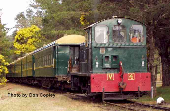 V4 puts onto opposite end of the sleeping cars to V5 to draw them down the yard to be put onto the rear of the Forest Ranger consist