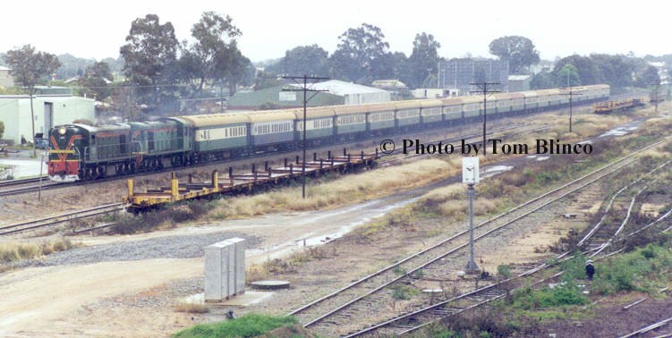 21 coach Avon Descent train with rarely seen double headed C class diesel electric locomotives rolls towards the Robinson Rd crossing whilst passing through the remains of Midland yard.