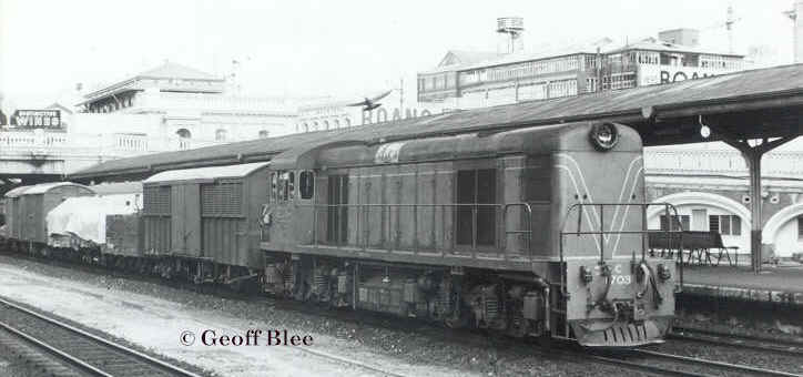 C1703 heads west with a goods through Perth station