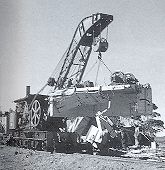 Steam Crane 23 at work, clearing the track after a derailment near wishbone in july 1976