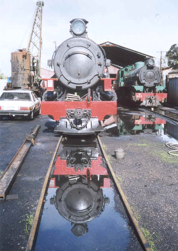 Pm 706 and W 903 rest outside the shed extensions at Pinjarra