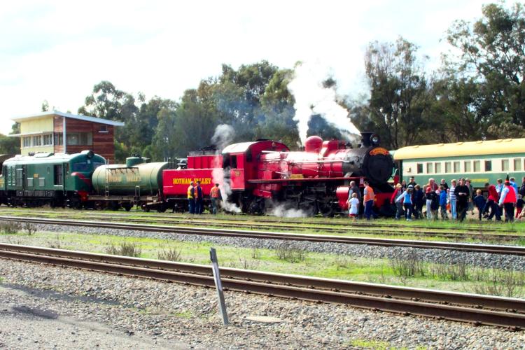 Upon arrival in Pinjarra the passengers swarm to the front of the Wizards Express to get their photo taken with this popular locomotive               Photo by Doug Bell